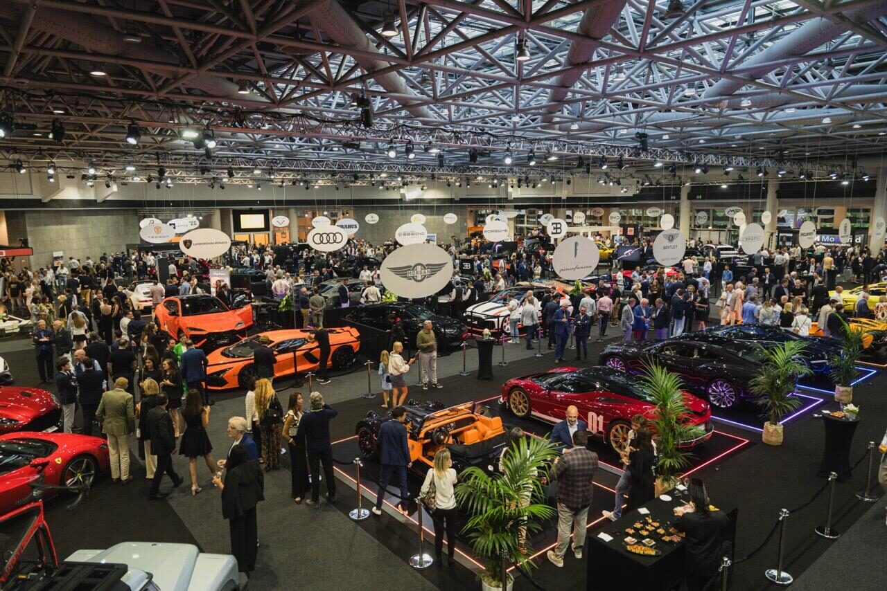Modern hypercar displayed at a Monaco motoring exhibition